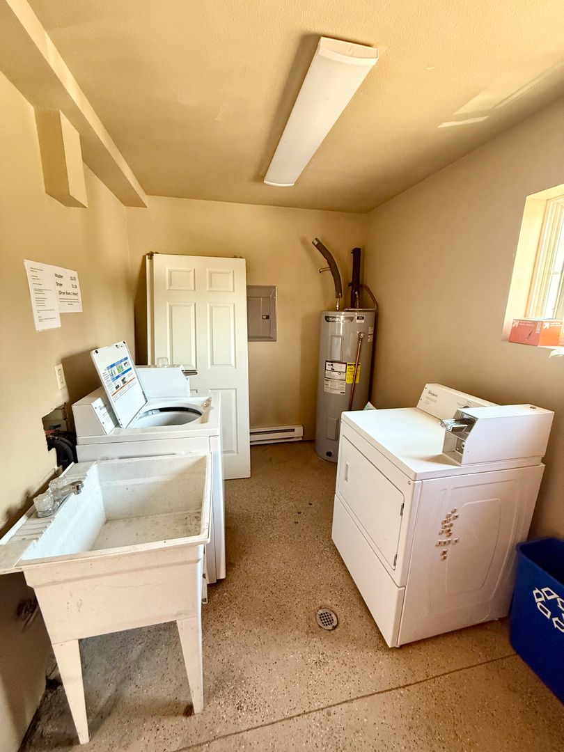 Laundry room at Move In & Save - 2 Week FREE Rent - Low Deposit!! 2 Bedroom Downtown Fort Collins Apartment | Walk to Old Town & CSU