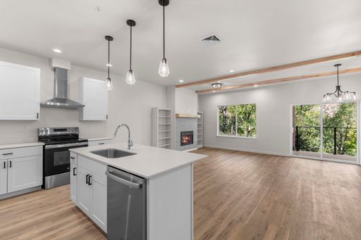 2 bed/2 bath Luxury Apartment with fireplace, carport parking and private patio!
