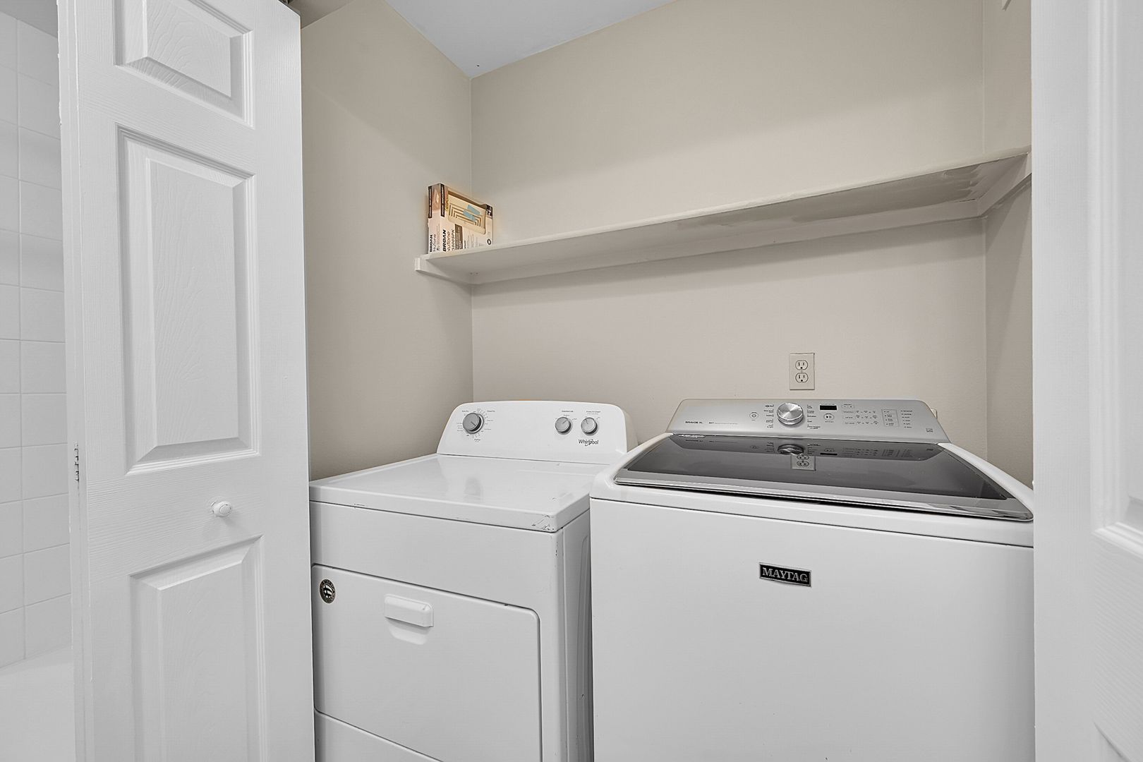 Laundry room at Middle Bay Way 7732
