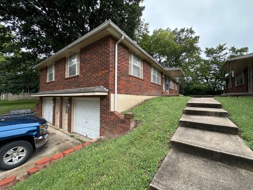 2 Bed / 1 Bath Townhouse with Attached Garage – photo 1