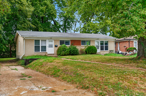 Charming Saint Ann Home with Full Basement, Spacious Yard & Move-In Ready Appeal! – photo 1
