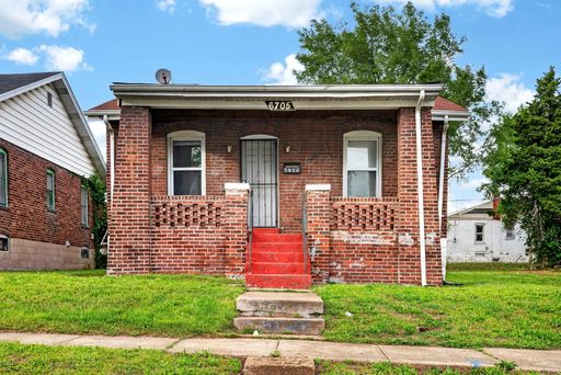 Your new home is waiting at 6705 St Louis Ave! – photo 1
