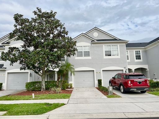 MOVE IN AUGUST! Beautiful 3 bed 2.5 bath townhome with large screened in back porch & 1 car attached garage!! In man gated Spring Isle/Avalon Park!! – photo 1