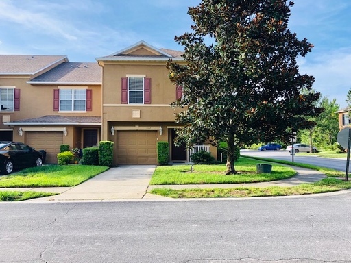 AMAZING OVIEDO/UCF AREA RENTAL! Wonderful 3 bd 2.5 bath corner unit townhome! 1 CAR ATTACHED GARAGE! NO CARPET! Tile on 1st floor/stairs & 2nd floor wood laminate! NEW RANGE, MICROWAVE & DISHWASHER! -FRESH PAINT- MOVE IN 8-1-2026!! – photo 1