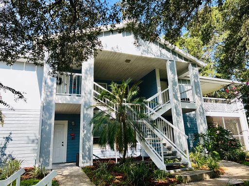 MOVE IN NOW!! NEW LAMINATE PLANK FLOORING & FRESH PAINT! Spacious 2nd floor- 2bd 2ba condo in gated community!! LARGE SCREENED IN BALCONY!