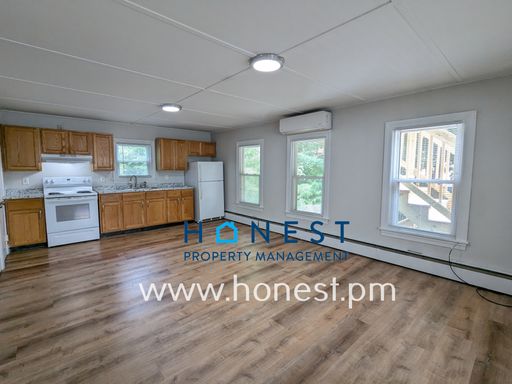 2 Bed, 1 Bath Waterville Apartment with Sun Porch and Off-Street Parking