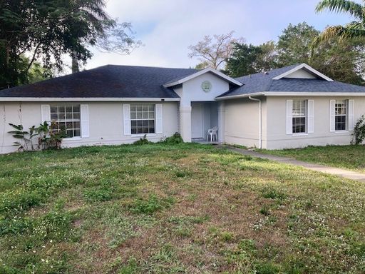 4 bedroom 1997 built home near everything at US41 & Collier Blvd - 2300 sf unfurnished home on 2 plus cleared grassy acres – photo 1