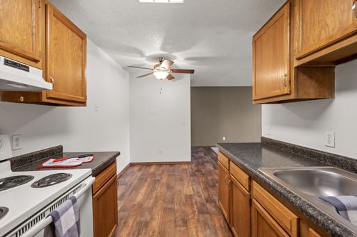 Upgraded corner style 2BR (938 sq. ft.) on 3rd floor with balcony. – photo 1