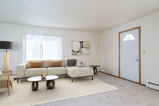 ***1st month FREE*** 2 Bedroom Ground Level Townhome w/ Attached Garage