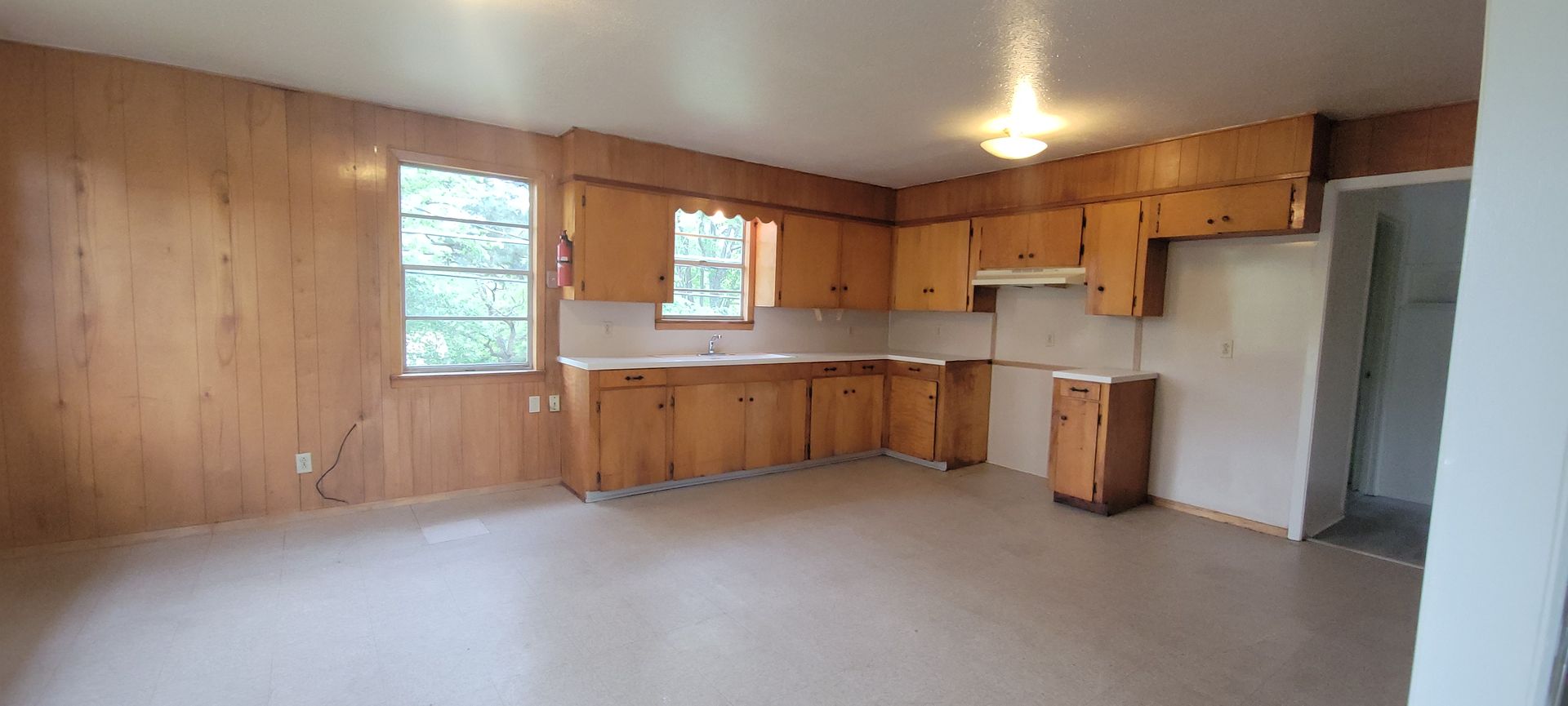 Huge 3 bedroom/1 bath upstairs apartment with Water, Gas Range and Refrigerator! 