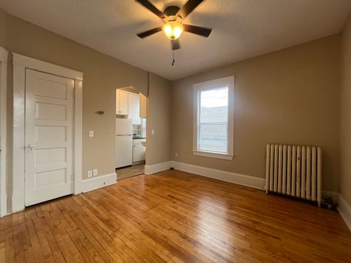 Spacious 2nd floor Corner Studio Unit on Beautiful Cathedral Hill! Owner pays Water/Sewer, Heat, Lawn and Snow Care!