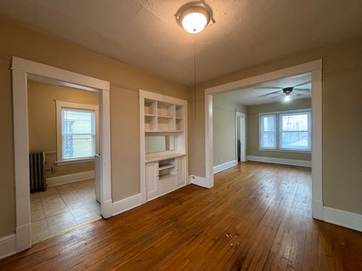 1 Bedroom Upper-Level Apartment with Hardwood Floors & Private Deck Entrance – photo 1