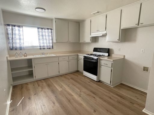 Downstairs Unit Coming Soon! – photo 1