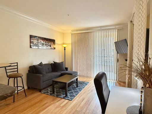 Meridian Furnished 1 Bed | 1 Bath Studio Luxury Condo with Partial Strip View – photo 1