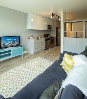 Now Offering One Month Free! Be a part of the community here and enjoy the view from the rooftop! – photo 1