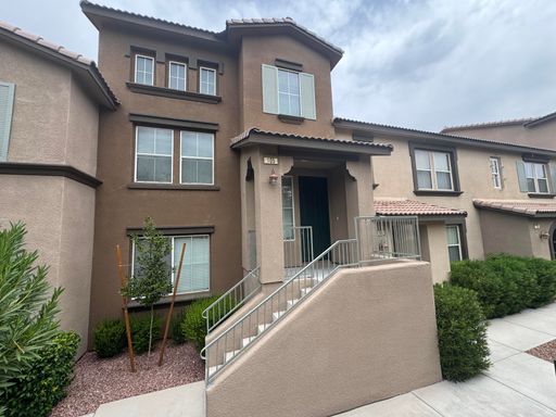 Welcome to this beautifully appointed 2-bedroom townhome in the highly desirable Summerlin community. – photo 1