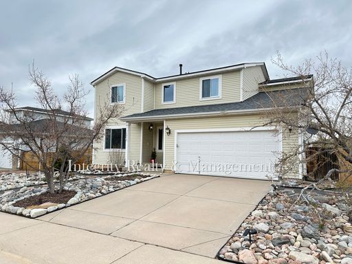 4 Bed/2.5 Bath, 2,252 Sqft - 7402 Eagle Rock Dr Littleton, CO 80125 – photo 1