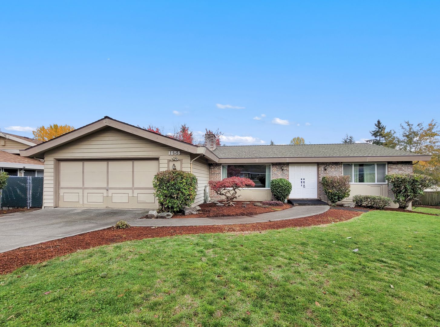 Charming Rambler with Abundant Natural Light through Large Windows