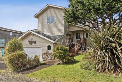 Ocean View 4 Bd home with hot tub, multiple decks, sun room, & washer/dryer included!