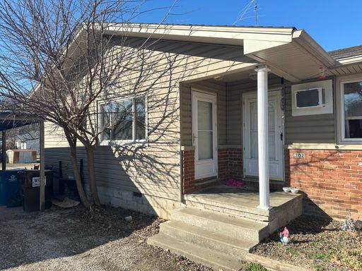 property 302 East New Melville Road