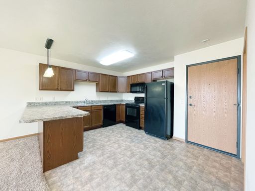 1 Bedroom on top floor! Pet Friendly, In-unit Laundry, Located in NW Minot! – photo 1