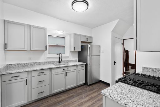 SENSATIONAL 3 BEDROOM IN DRAVOSBURG AVAILABLE NOW! NEWLY RENOVATED FEATURING UPDATED KITCHEN & CENTRAL A/C!