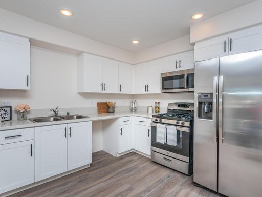 Luxury Apt. W/ Parking Space + Patio Third Floor – photo 1