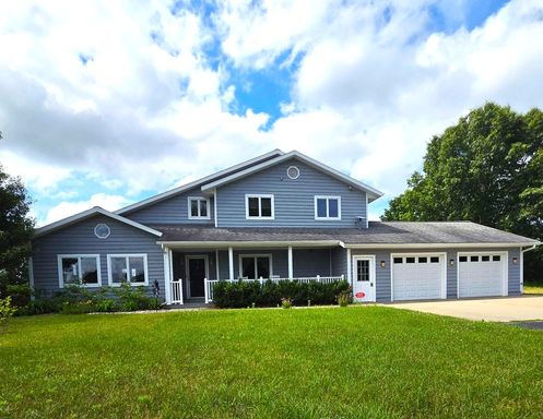 ***NEW LOWER PRICE & SHORT-TERM LEASE OPTIONS AVAILABLE*** Spacious 4-Bedroom Home with 4-Car Garage
