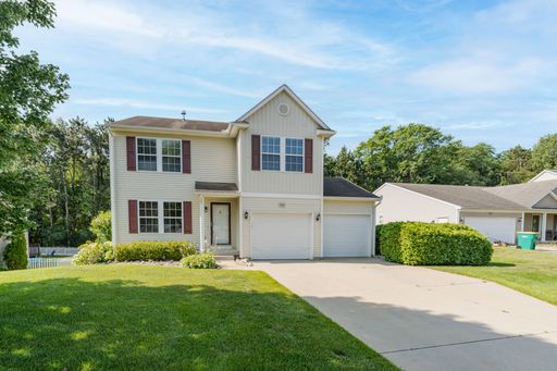 Spacious 4-bedroom, 4-Bath Home in Desirable Portage Neighborhood – photo 1