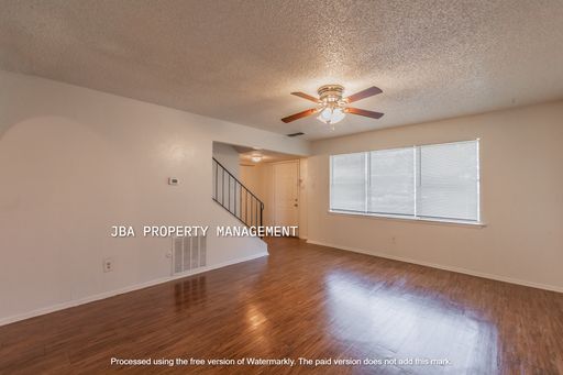 Spacious 1,440 Sq. Ft. Townhome with Fenced Backyard – photo 1