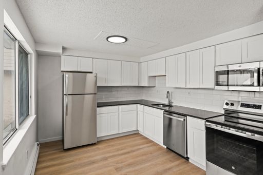 3 Bed/1 Bath RENOVATED Camillus Deluxe Apartments includes HEAT! – photo 1