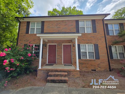 Brick 2 Bed/1.5 Bath Townhome in Excellent Concord Location! – photo 1