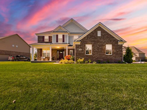 Stunning South Lyon Home with Outdoor Oasis!