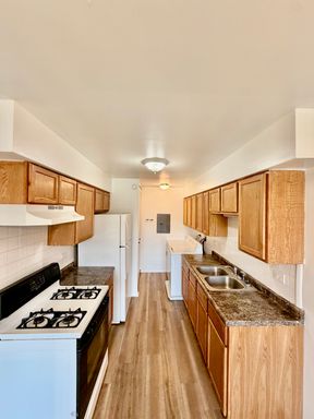 Spacious 2 Bedroom Home with Private Backyard & In-Unit Laundry