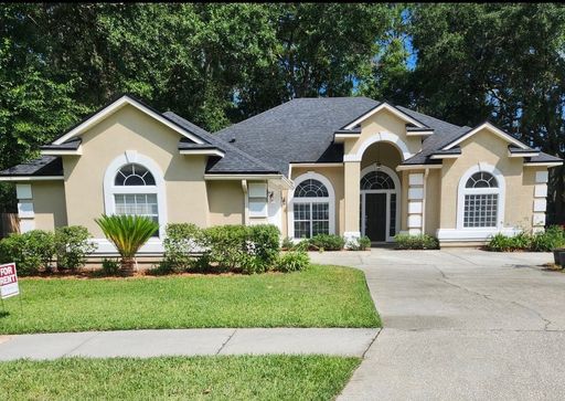 Lakefront Views, Fresh Updates & Lawn Care Included – Just Minutes from Amelia Island!