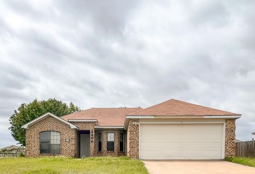 Available NOW This charming 1 story, 3 bedroom, 2 bath house could be your next home! Beautiful wood look flooring with tile flooring in the wet areas. Large master bedroom suite includes master bath and walk in closet. Washer/dryer utility room is loca – photo 1
