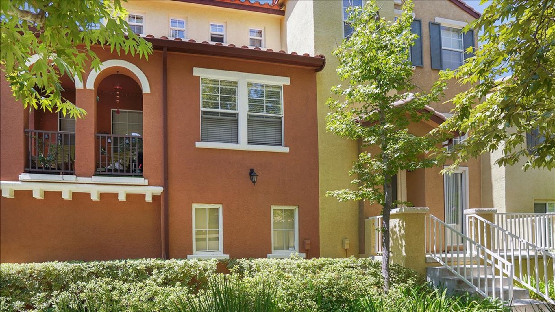 Beautiful Tri-Level Valencia Townhome with Dual Master Suites and Community Pool