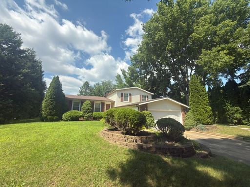 Updated 4-Bedroom Home Near Meadowbrook Park with Attached 2-Car Garage – photo 1