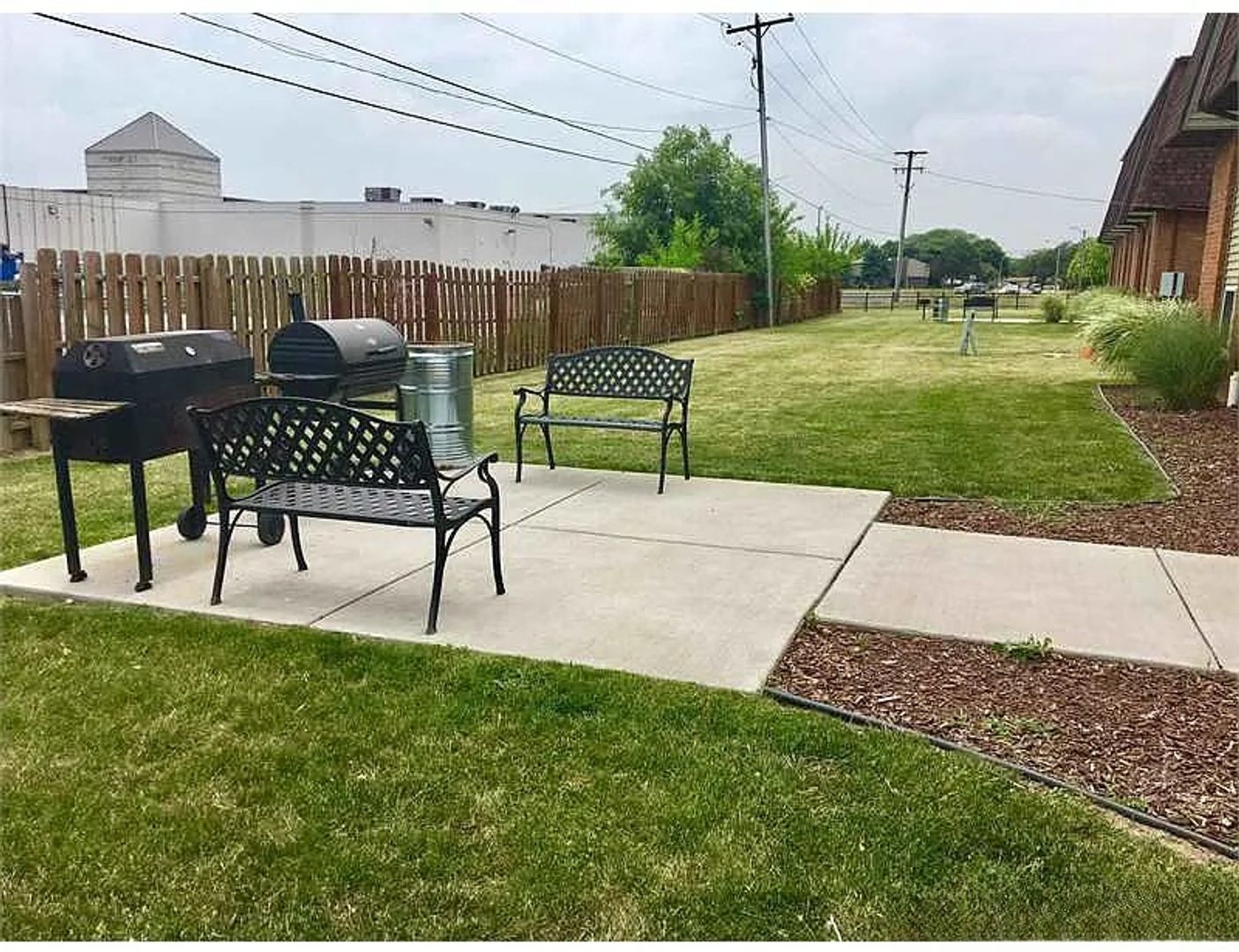 Grill area at APPLETON OF MONROE GROUP , LLC