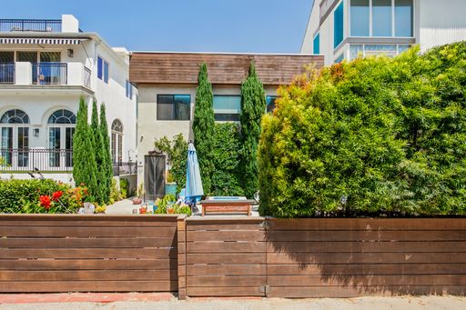 Coastal Sophistication Meets Smart-Home Mastery - 2 bed 2 bath Unit in Duplex, Just Steps from the Ocean!