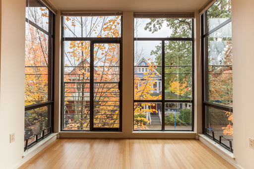 Contemporary Style with Floor to Ceiling Windows and Garage Parking Available! – photo 1