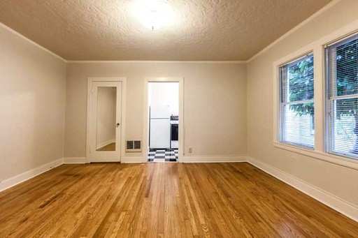Charming 1920s Corner Unit Flat with Generous Storage in NW! – photo 1