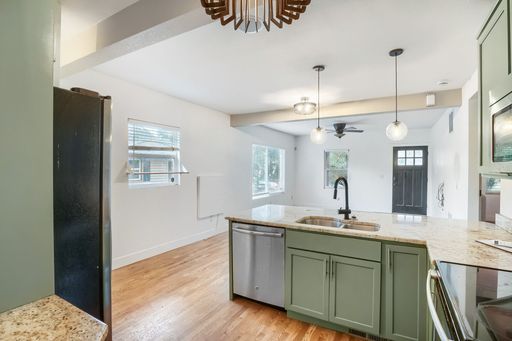 Modern 3-Bedroom Oasis with Solar Savings, Central Air, and Spacious Yard – photo 1
