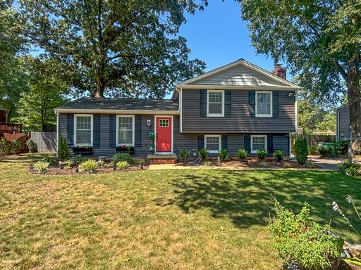 Spacious 4-Bedroom Home in a Convenient Richmond Location with Finished Basement – photo 1