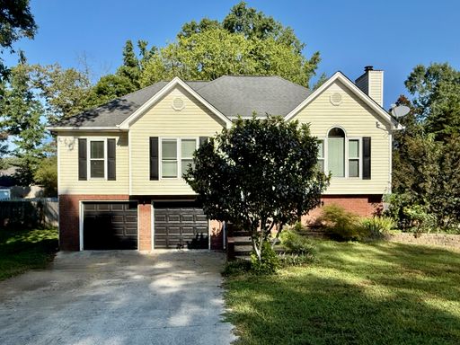 Spacious 4-Bedroom Ooltewah Home with Attached Garage, Bonus Room, and Back Deck!