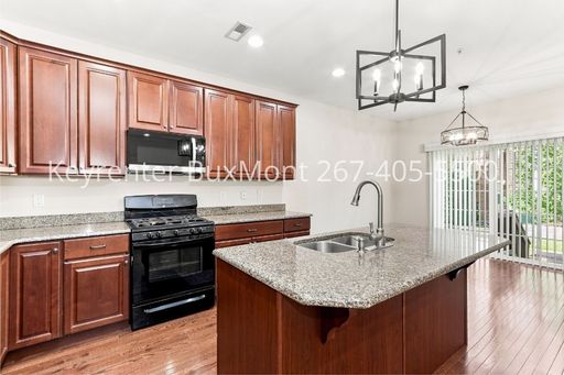Spacious 3-Bedroom Heritage Center Townhome with Finished Basement