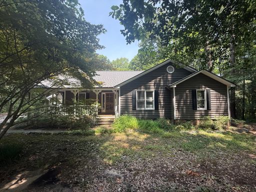 Private 3BD, 2BA Willow Spring Home on a Large Lot Backing up to Forest – photo 1