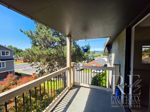 $500 OFF 1st MO RENT - Top-Floor End Unit with Private Balcony, Mountain Peek Views & Fresh New Carpet – photo 1