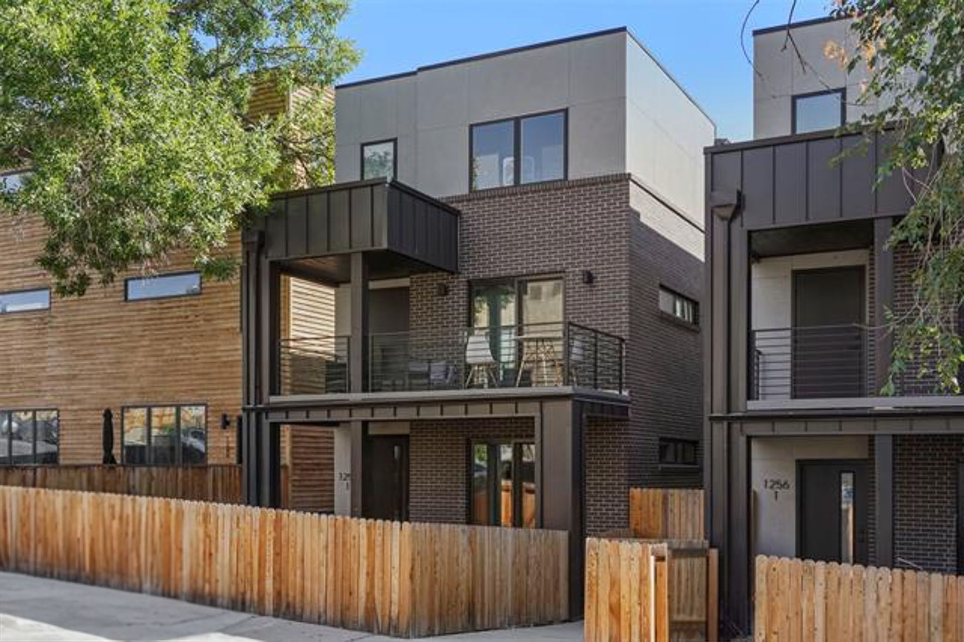 1258 Newton St Unit 1- 4-Bed Townhome with Finished Basement & Private Garage + 1 Month Free!