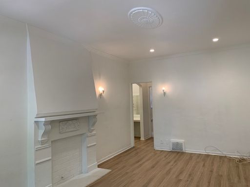 1+1 = Mintage Mediterranean Charm with Modern Updates - Plank Floors, a/c, Decorative Fireplace